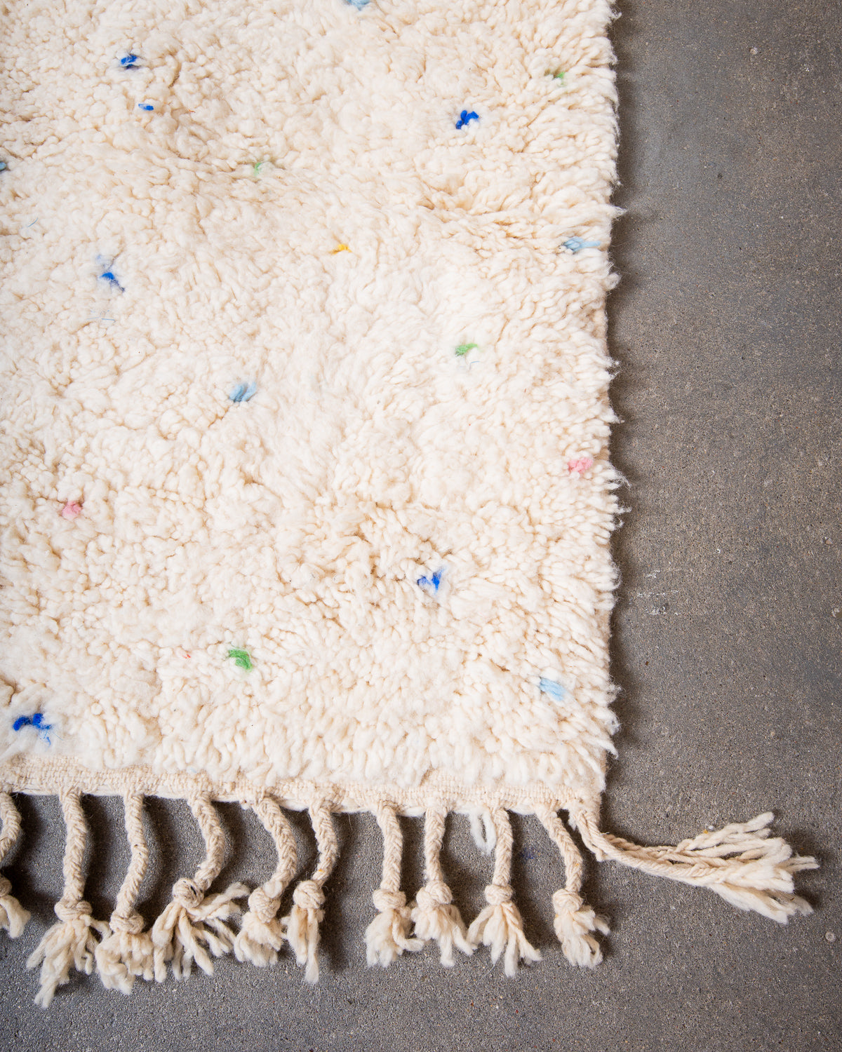 Modern, designer, handcrafted Berber rug from Morocco. Beniourain carpet with beautiful colours and patterns and fluffy wool texture.